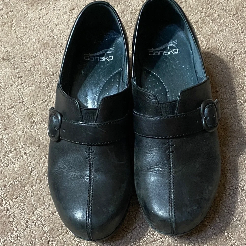 Dansko Black Leather Slip-On Size 36 (6) Loafers with Buckle Accent Clogs